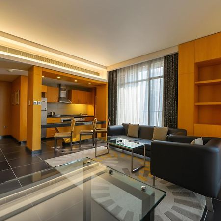 Hala Arjaan By Rotana, Deluxe Hotel Apartments Абу-Даби Экстерьер фото